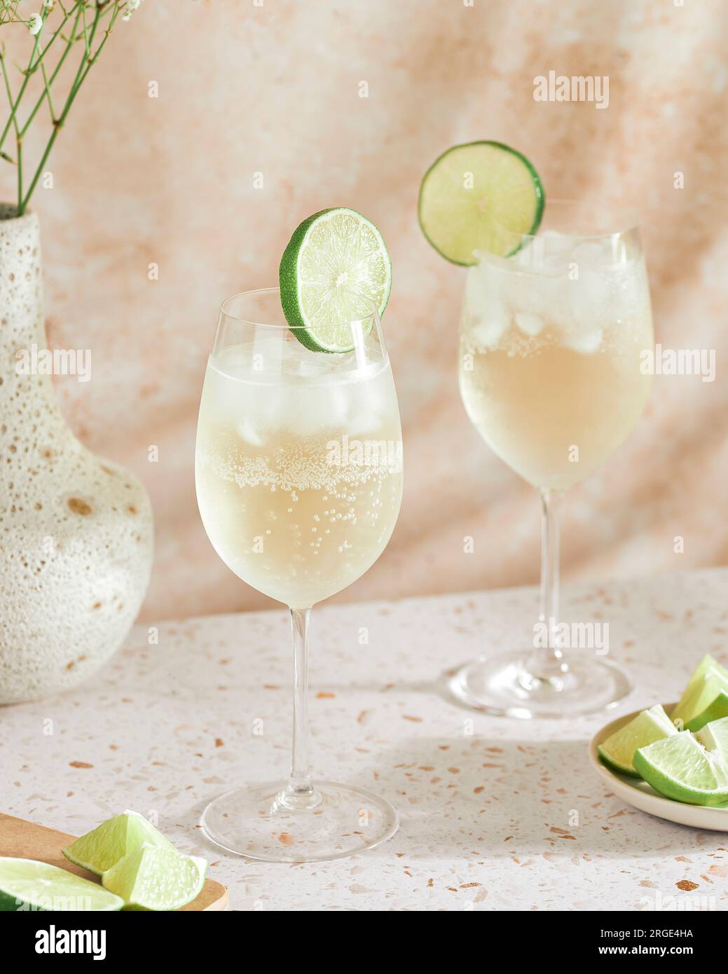 Two Wine Spritzers with Lime Stock Photo