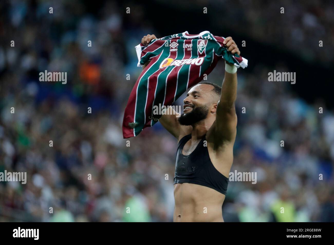 Samuel Xavier of Brazil's Fluminense, center, and Rene of Brazil's  Internacional head the ball during a Copa Libertadores semifinal second leg  soccer match at Beira Rio stadium in Porto Alegre, Brazil, Wednesday