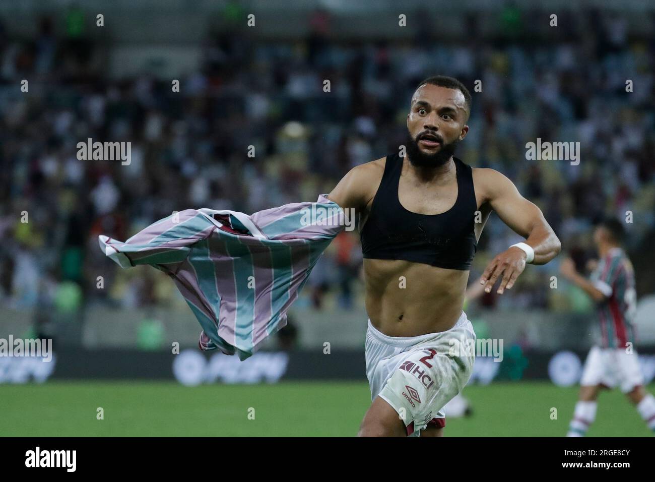 Samuel Xavier of Brazil's Fluminense, center, and Rene of Brazil's  Internacional head the ball during a Copa Libertadores semifinal second leg  soccer match at Beira Rio stadium in Porto Alegre, Brazil, Wednesday