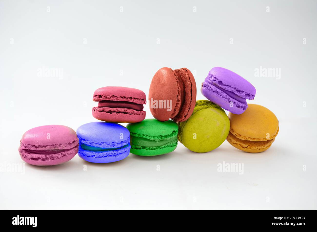 Bright macarons isolated on a white background. Stock Photo