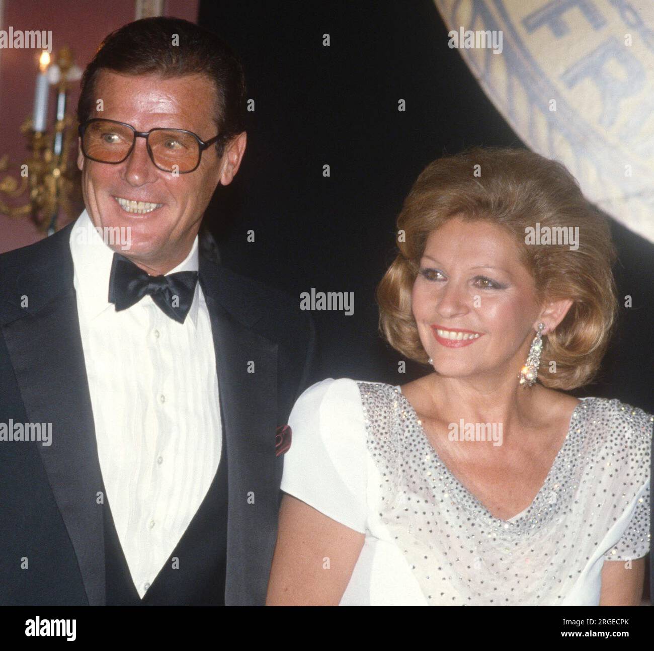 1986 Roger Moore Luisa Mattioni wife John Barrett/Photolink / MediaPunch Stock Photo