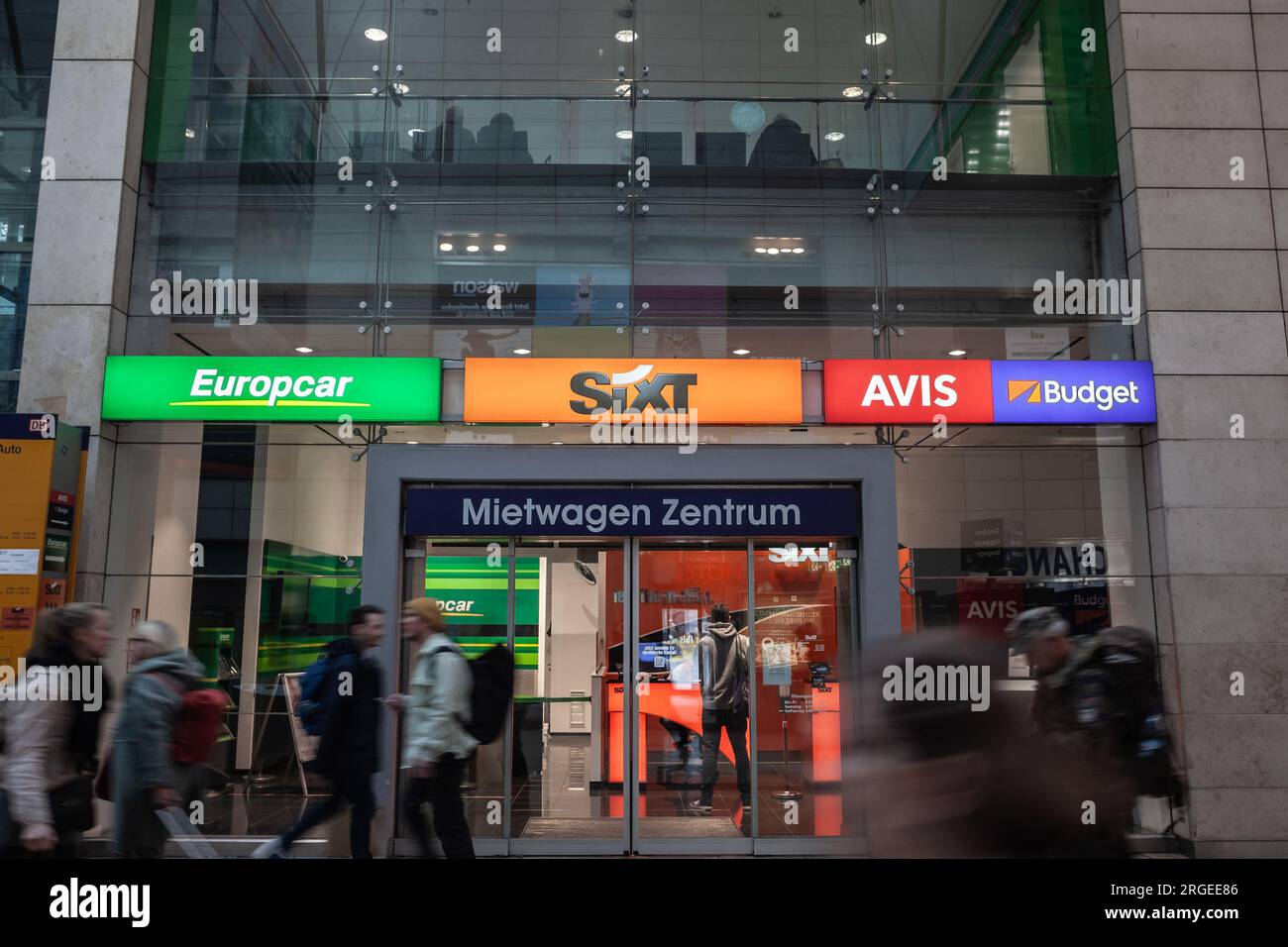 Picture of the signs of Sixt, Europcar, Avis and Budget Rent a Car and on their joint agency in Cologne, Germany. Stock Photo