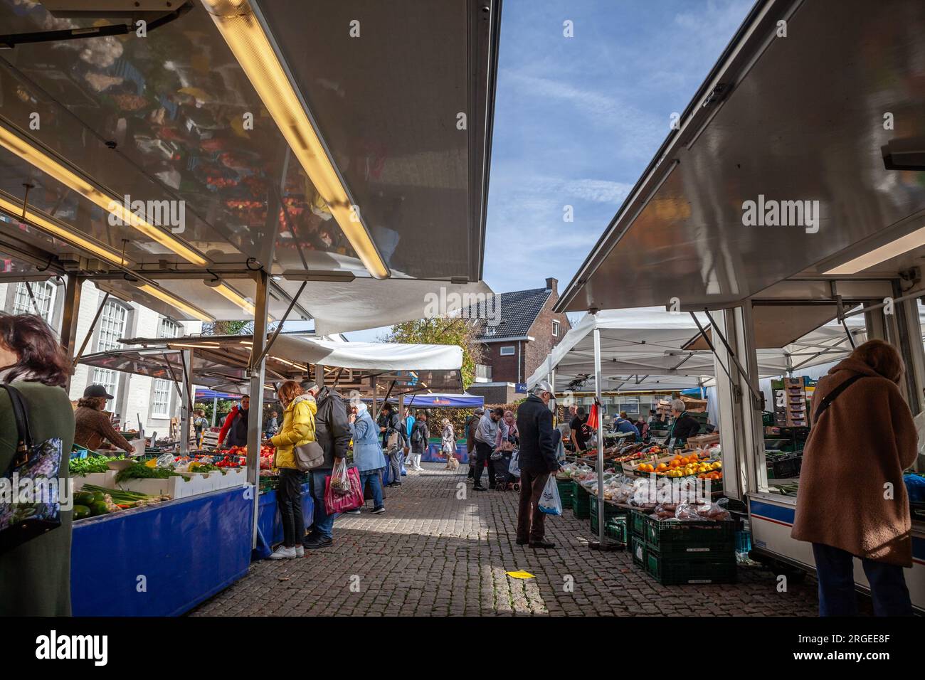 Picture of stalls of Vaals Farmers market iwith crowd of people passing by  in Vaals, Netherlands. its a landmark of Limburg agriculture Stock Photo -  Alamy