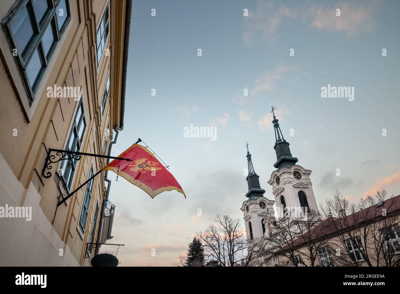 Picture of the flag of Montenegro waiving in front of the consulate of Montenegro in Sremski karlovci, Serbia. The Montenegrins of Serbia are a nation Stock Photo