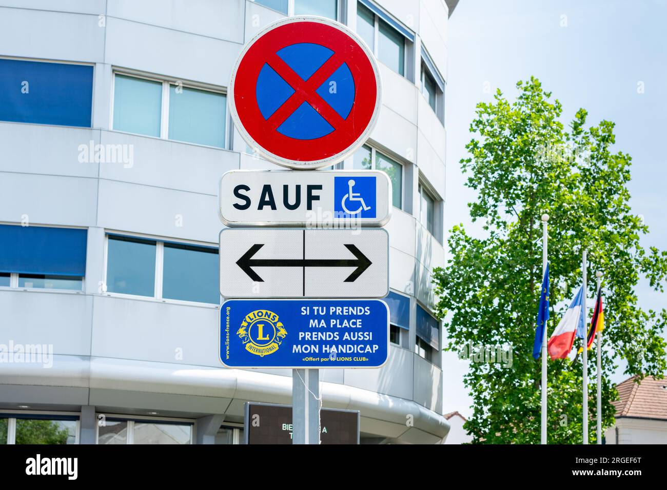 Parking sign reserved for people with disabilities in France Stock Photo