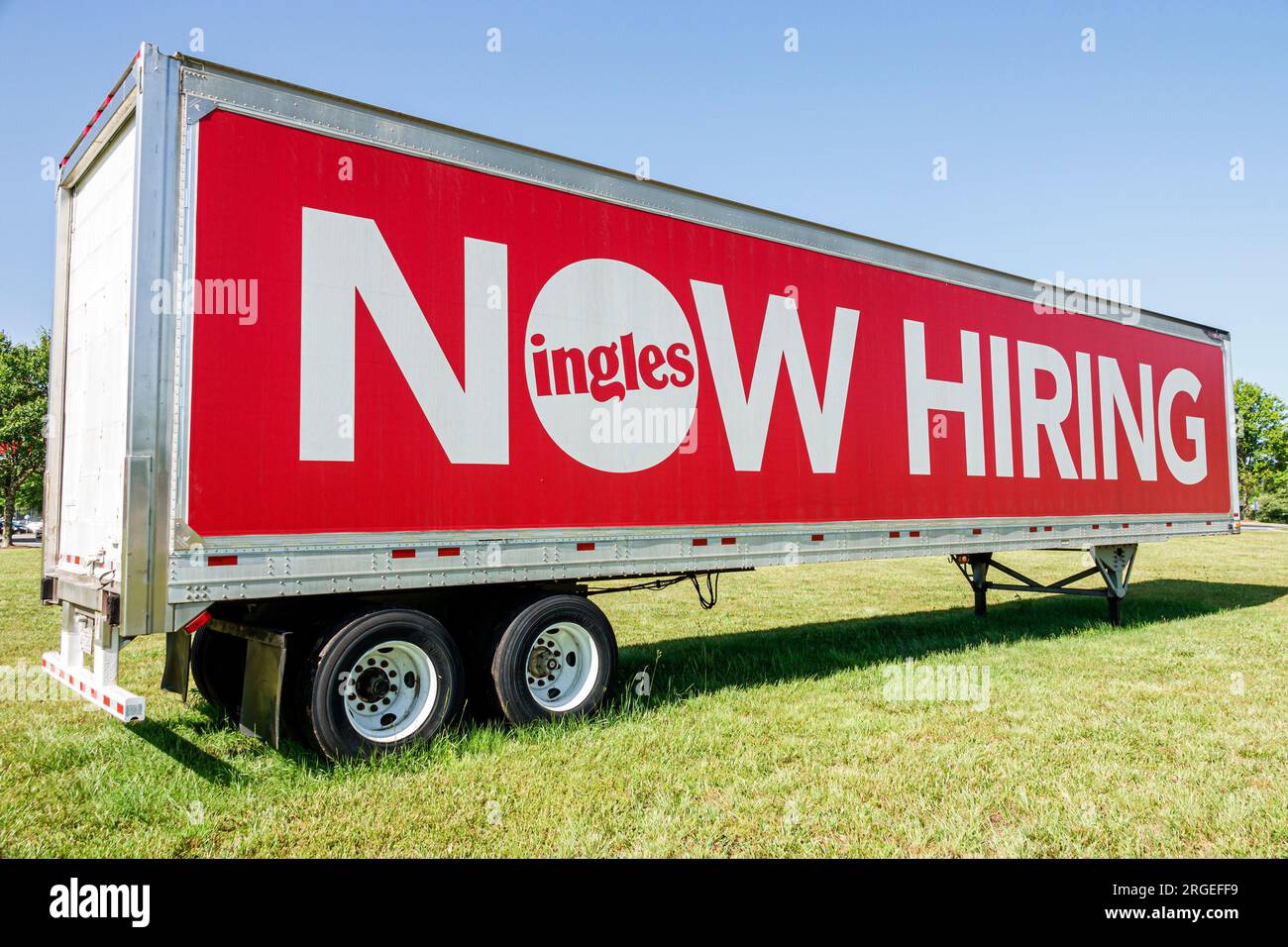 Flat Rock North Carolina,parked tractor trailer billboard,help wanted now hiring,Ingles supermarket grocery store chain,sign information,promoting pro Stock Photo