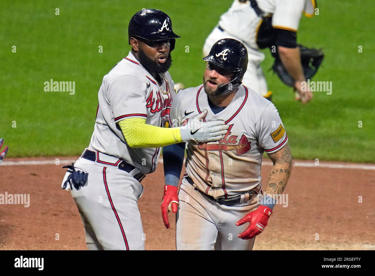 Atlanta Braves' Marcell Ozuna, left, and Kevin Pillar, celebrate after ...