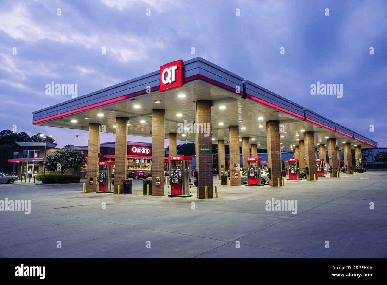 Gastonia North Carolina,QT QuickTrip convenience store gas petrol station pumps,evening night empty,sign information Stock Photo