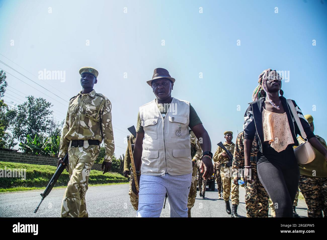 Kenyan elephant campaigner and research scientist, Jim Justus Nyamu (C ...