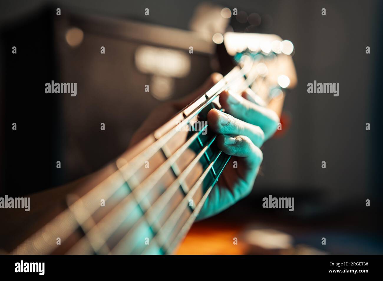Bassist playing 5 strings bass Stock Photo