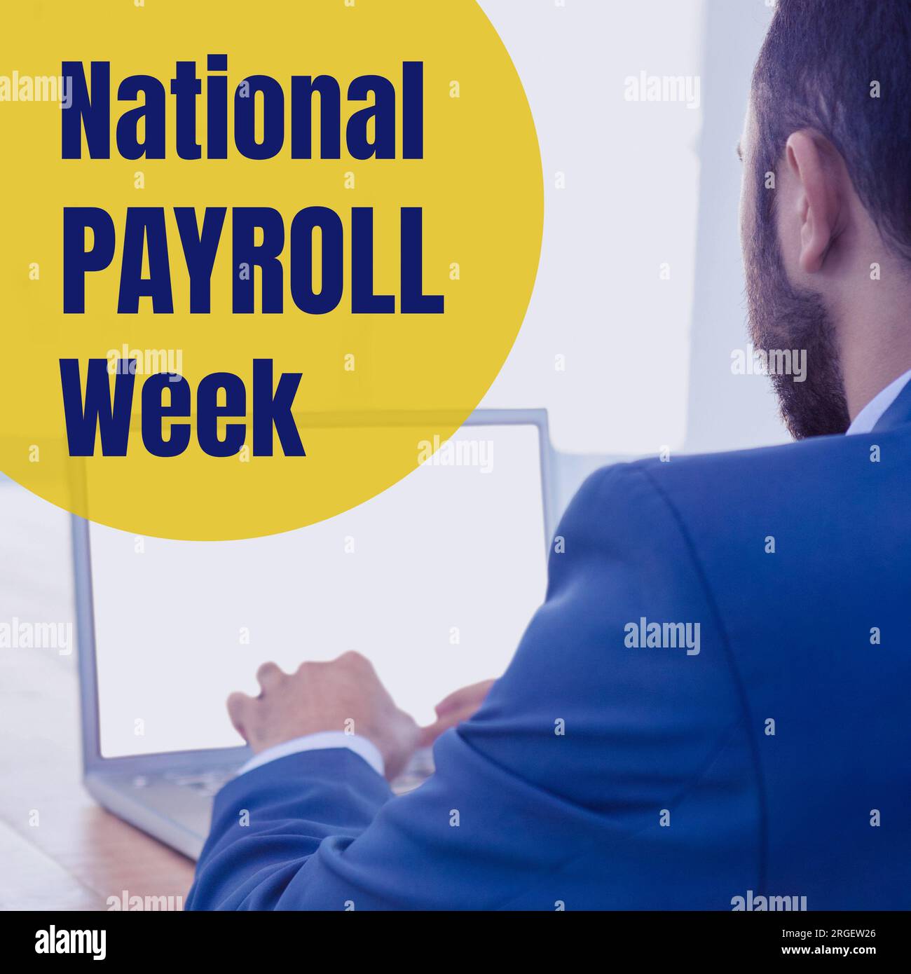 National payroll week text on yellow over biracial businessman using laptop Stock Photo