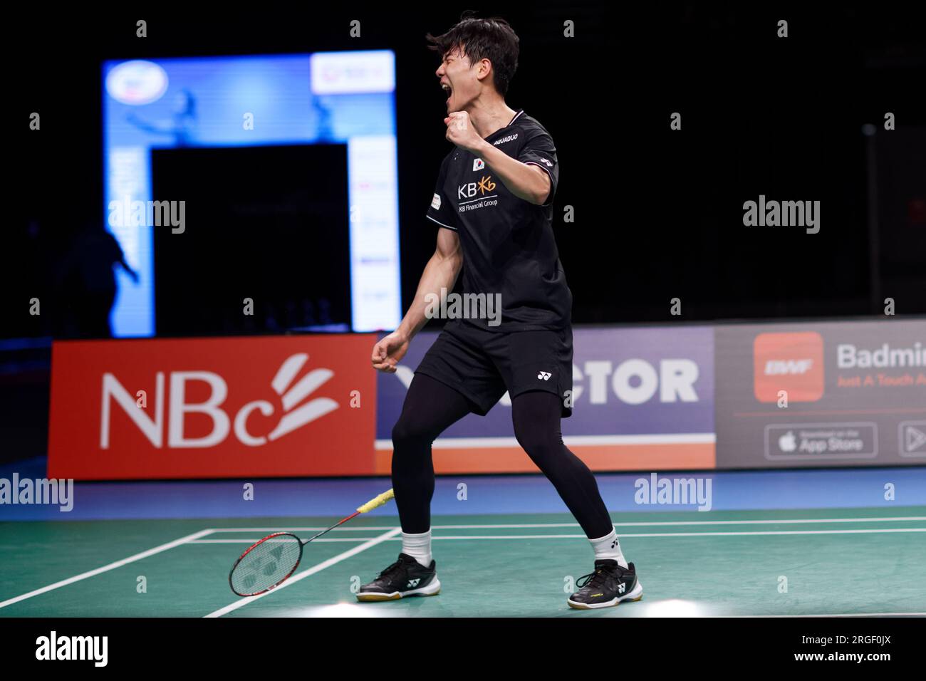 Kang Min Hyuk of Korea in action during the mens doubles finals match