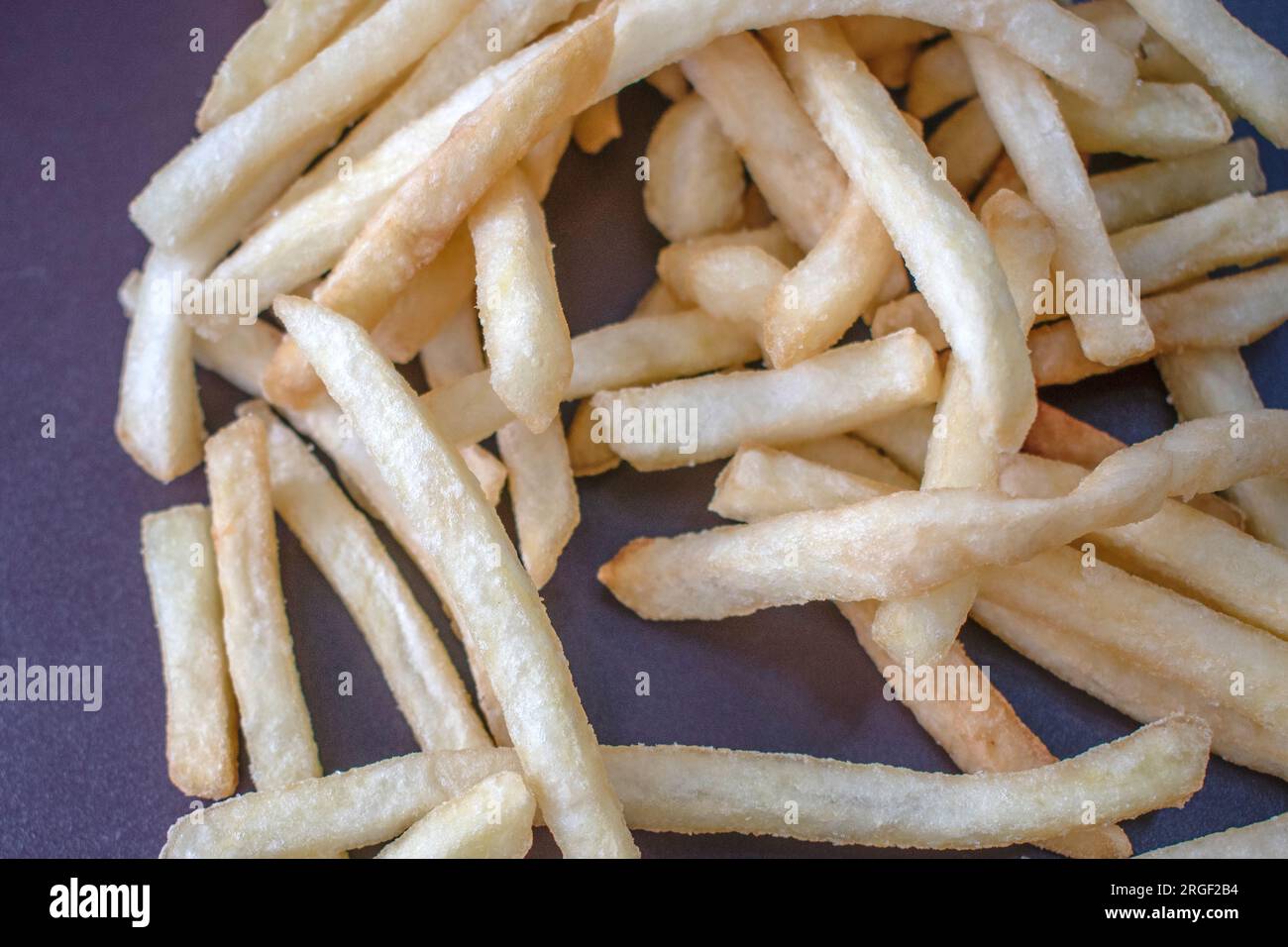 French Fries Closeup photograph showcasing freshly cooked and perfectly golden French fries