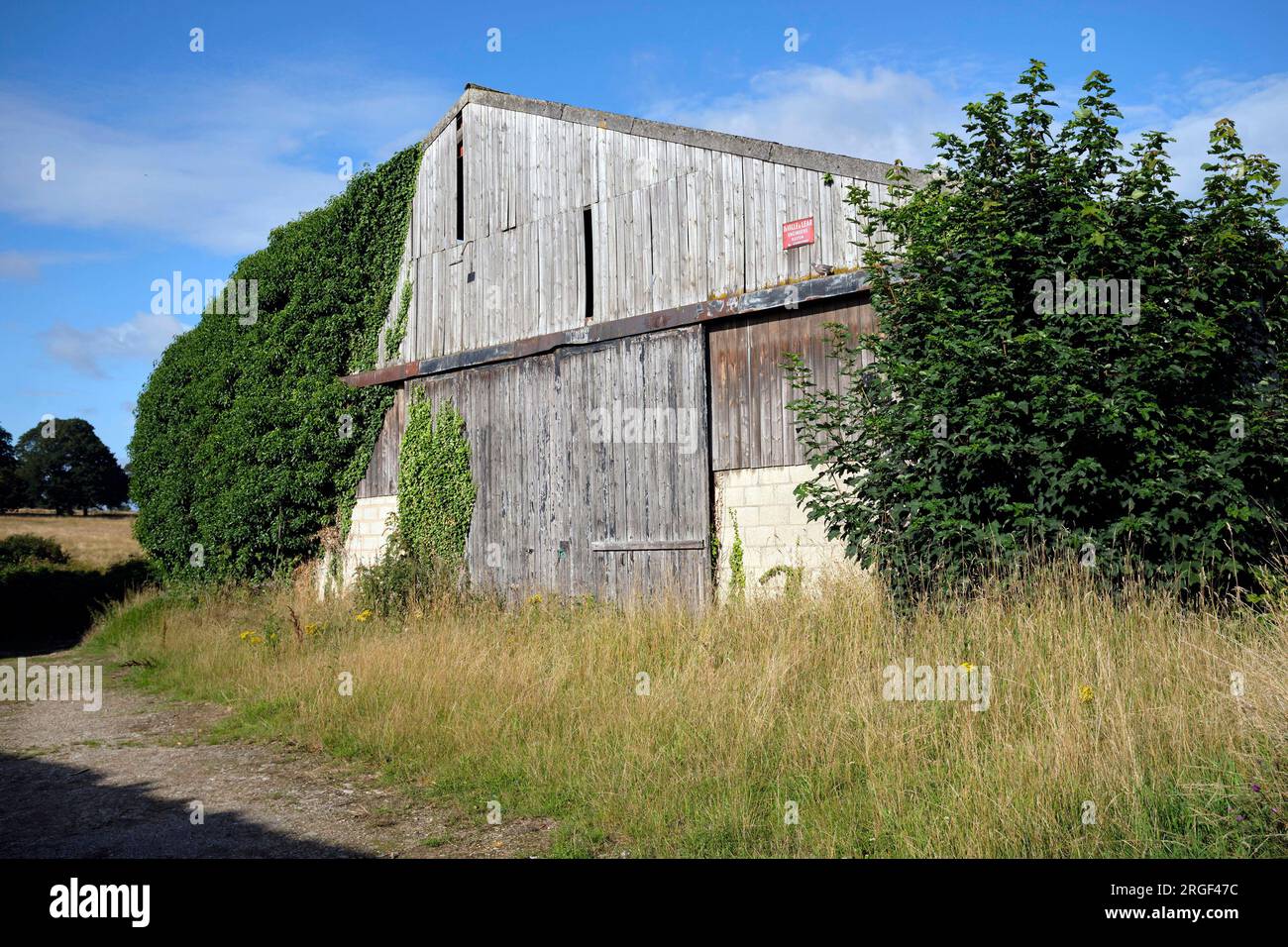 An old wooden agricultural barn, Rural community of Womersley, North Yorkshire, northern England, UK Stock Photo