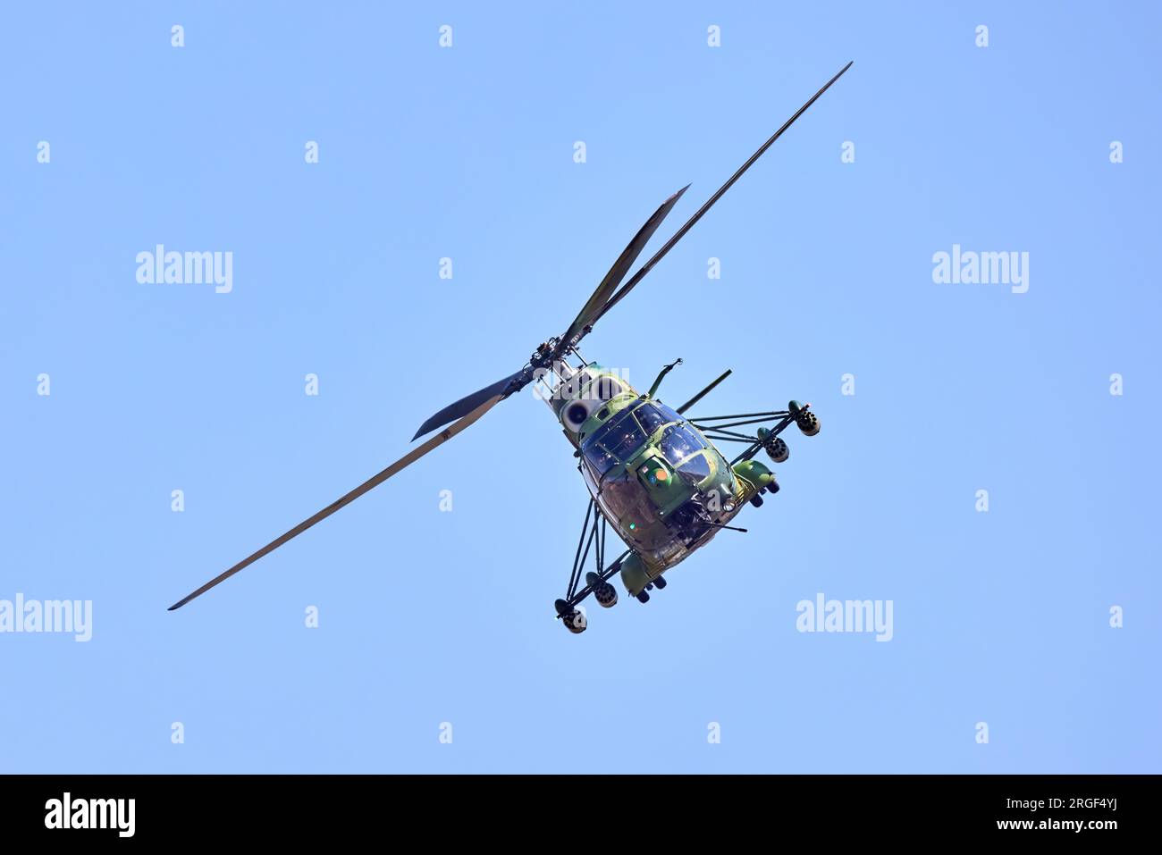 Puma Socat IAR - 330 helicopter performing a demonstration flight. Military helicopter in camouflage colors. Stock Photo