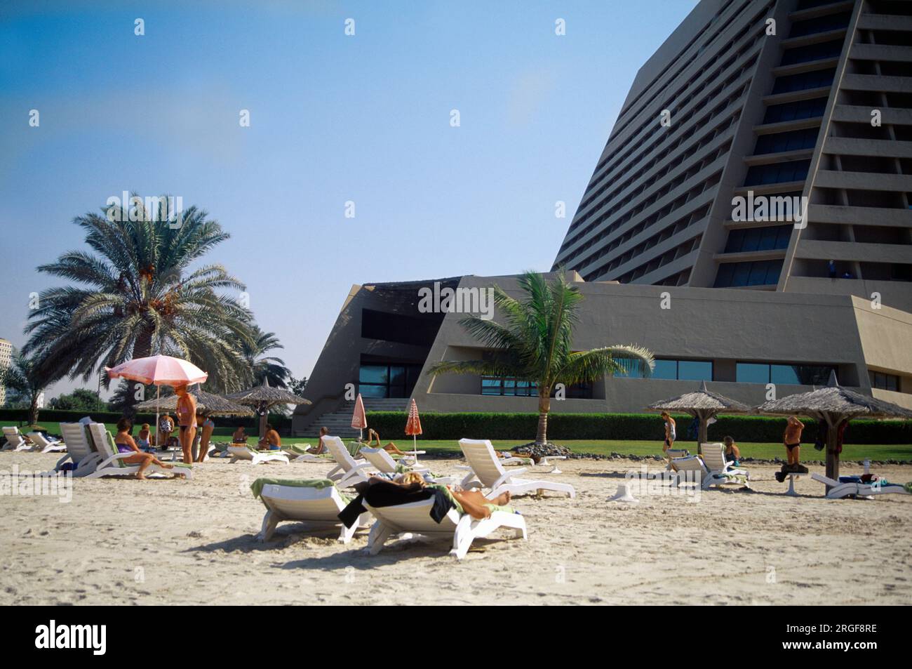 Sharjah UAE Continental Hotel Beach Tourists Sunbathing Stock Photo - Alamy