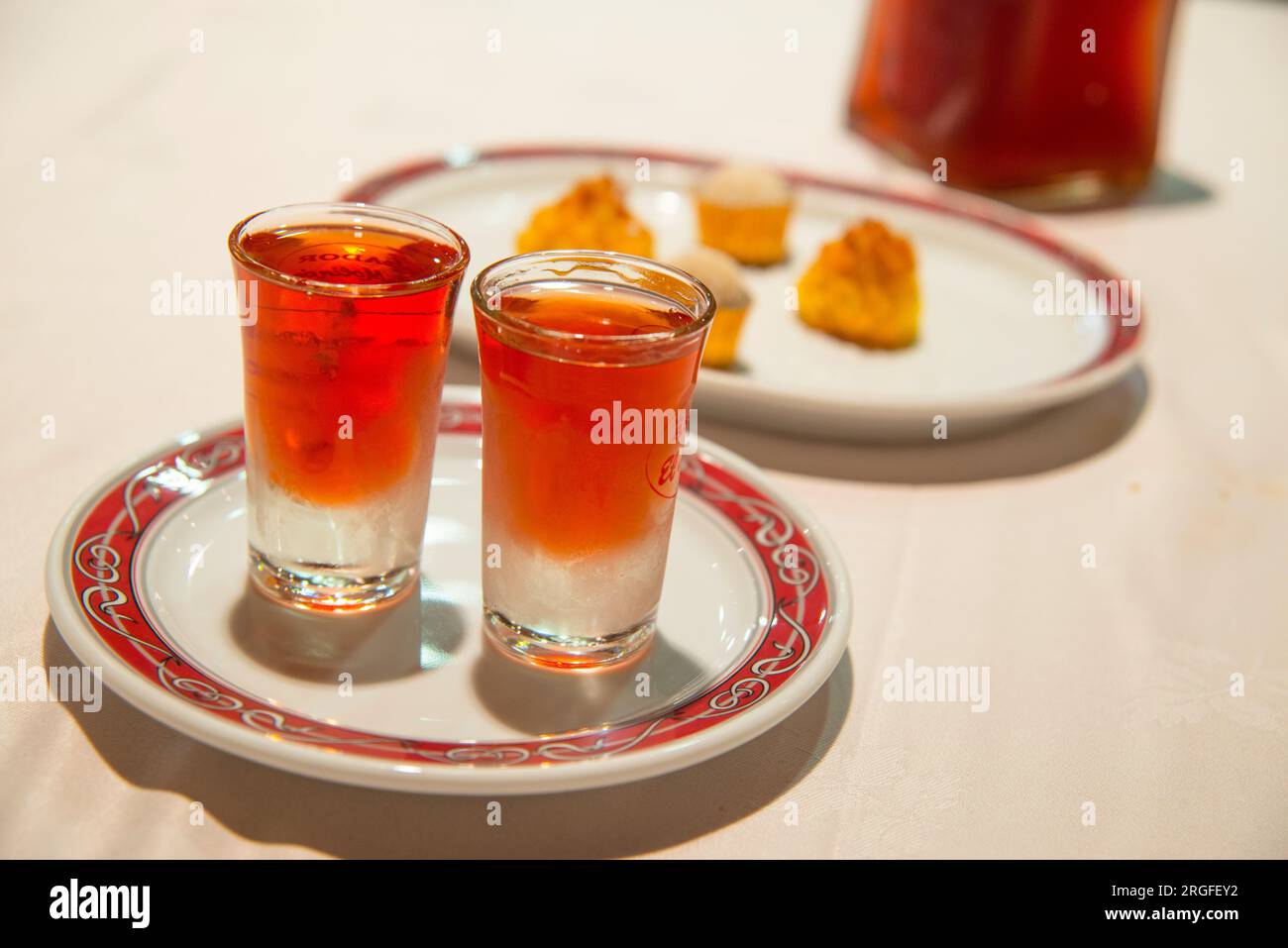 Two glasses of Pacharan liqueur. Spain. Stock Photo