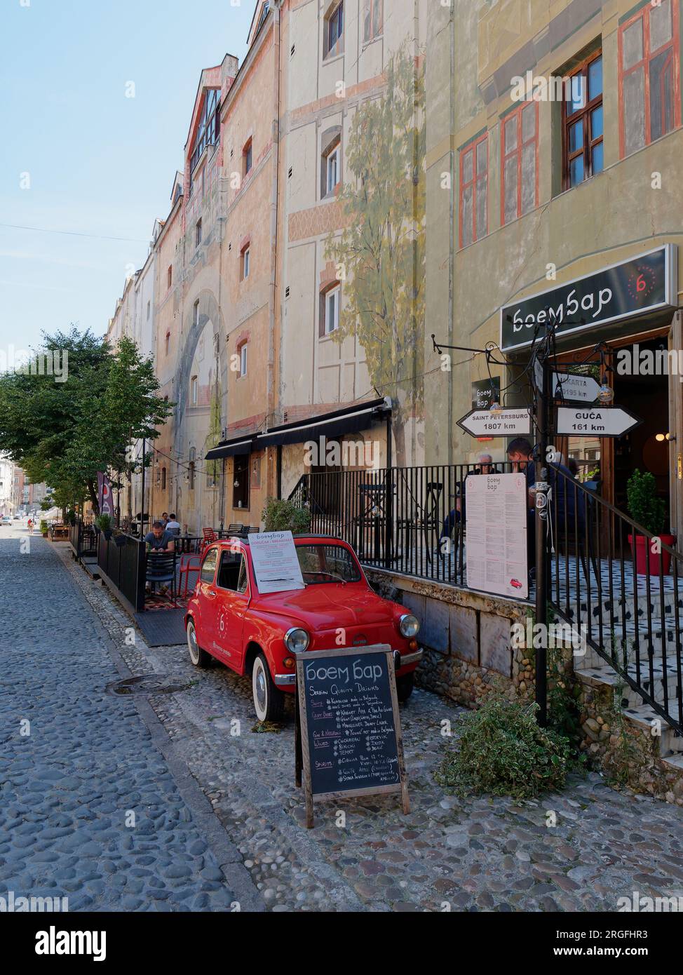 The famous bohemian cobbled Skadarlija street with cafes and restaurants in the city of Belgrade, Serbia. August 9, 2023.. Stock Photo