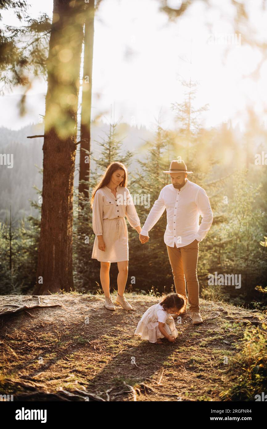 Young happy family hi-res stock photography and images - Alamy