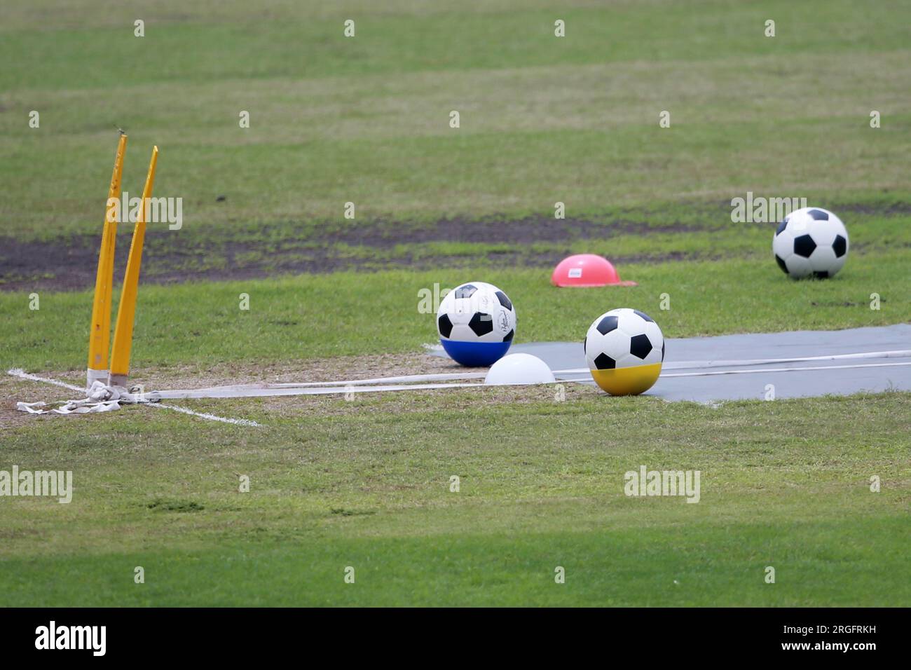 Bowling pitch decorated by football during Bangladeshi national cricketers attend practice session at Sher-e-Bangla National Cricket Stadium in Mirpur Stock Photo