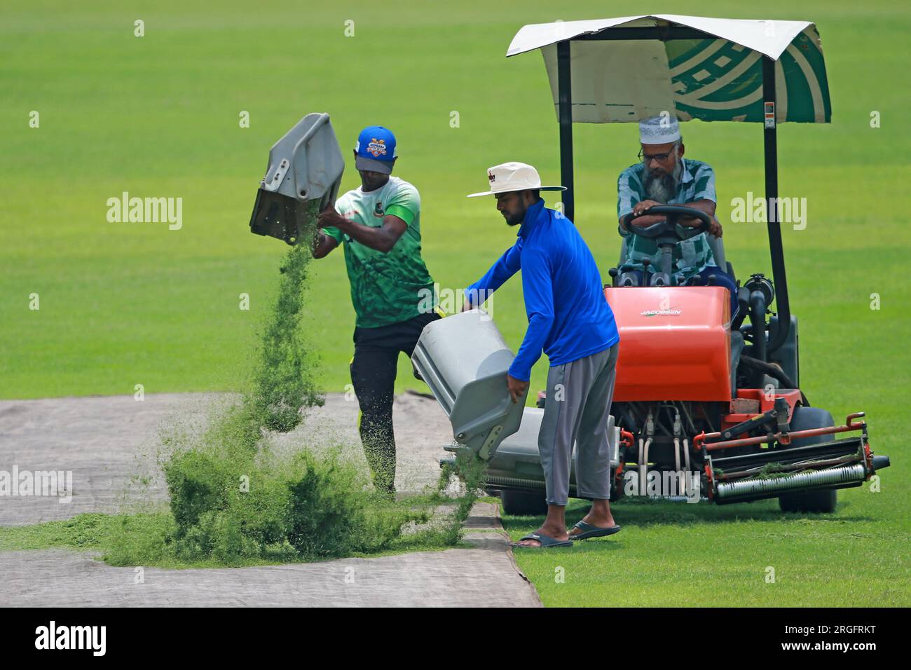 Groundsmen preparing the ground as Bangladeshi national cricketers ...