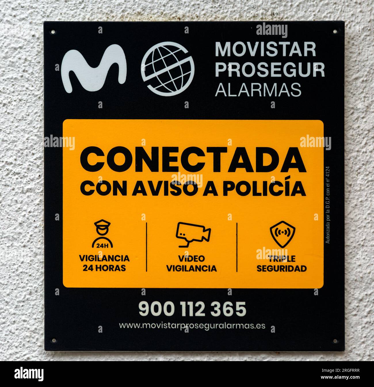 Close up of Movistar Prosegur alarmas domestic security alarms sign linked with police, Galicia, Spain Stock Photo