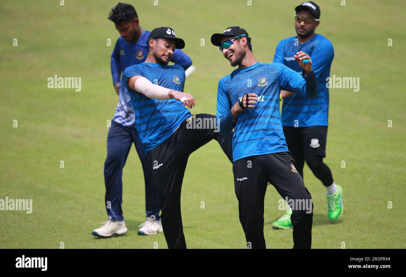 Nazmul hasan Shanto (L) and Naim Sheikh (R)  make fun during the Bangladeshi national cricketers attend practice session at Sher-e-Bangla National Cri Stock Photo