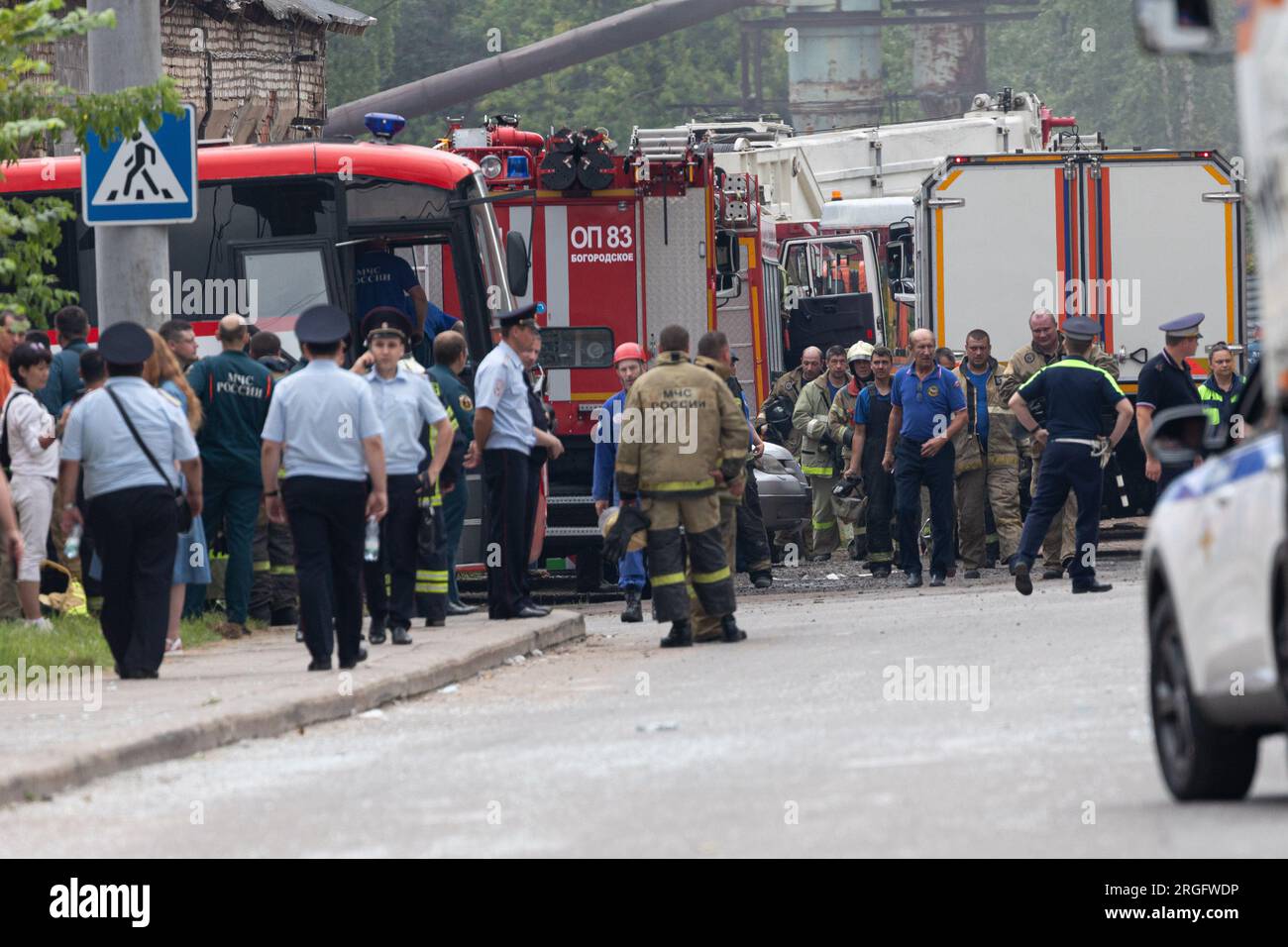 (230809) -- MOSCOW, Aug. 9, 2023 (Xinhua) -- Rescuers are seen at the blast site of a plant in Moscow region, Russia, Aug. 9, 2023. Forty-three people have been injured so far in a blast at an optical-mechanical plant in the city of Sergiev Posad in the Moscow region on Wednesday, local authorities said. The explosion happened on Wednesday morning at around 10:40 a.m. local time (0740 GMT) at a pyrotechnics warehouse, which was being rented out on the optical-mechanical plant's territory by a private company, said Governor of the Moscow Region Andrei Vorobiev in a Telegram post. (Xinhua/Bai Stock Photo