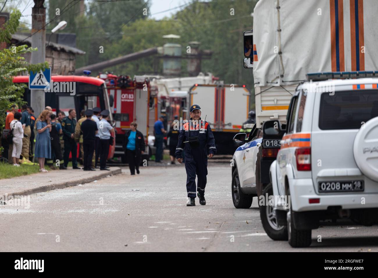 (230809) -- MOSCOW, Aug. 9, 2023 (Xinhua) -- Rescuers and vehicles are seen at the blast site of a plant in Moscow region, Russia, Aug. 9, 2023. Forty-three people have been injured so far in a blast at an optical-mechanical plant in the city of Sergiev Posad in the Moscow region on Wednesday, local authorities said. The explosion happened on Wednesday morning at around 10:40 a.m. local time (0740 GMT) at a pyrotechnics warehouse, which was being rented out on the optical-mechanical plant's territory by a private company, said Governor of the Moscow Region Andrei Vorobiev in a Telegram post. Stock Photo