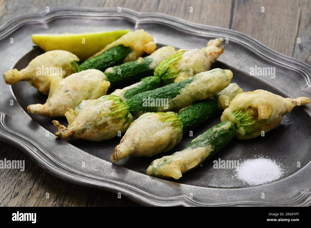 stuffed zucchini flower fritters, Italian cuisine Stock Photo