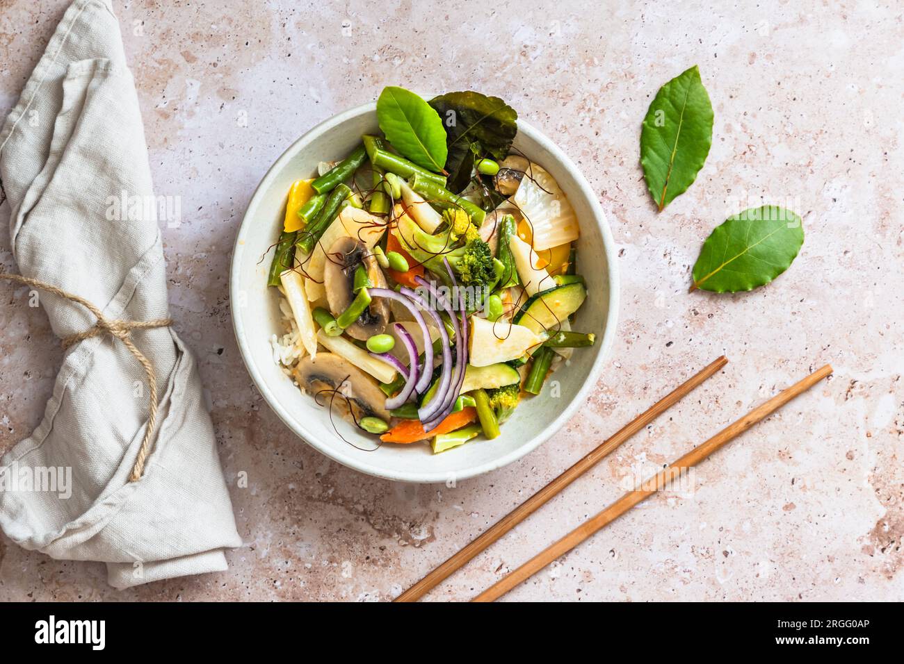 Bowl with Asian vegetables, vegan curry, healthy food. Top view. Stock Photo