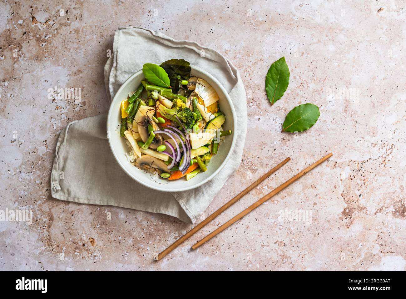 Bowl with Asian vegetables, vegan curry, healthy food. Top view. Stock Photo