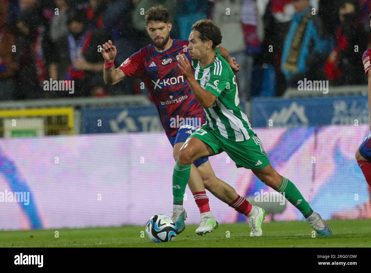 Jean Carlos of Rakow Czestochowa (L) and Karol Struski of Aris Limassol ...