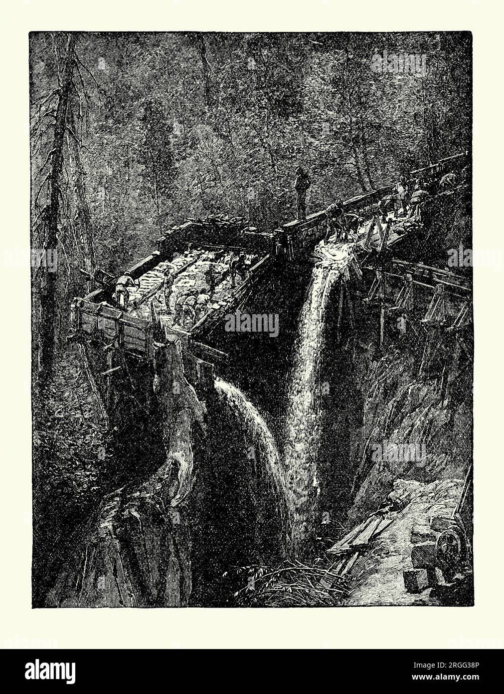 An old engraving of men searching for gold in water sluices and races in 1848, the earliest times of the California gold rush in the Sierra Nevada foothills, California, USA. It is from an American history book of 1895. Gold was first discovered at Sutter’s Mill (after its owner John Sutter), a water-powered sawmill on the bank of the South Fork American River in the Sierra Nevada, California. A worker constructing the mill, James W Marshall, found gold there in 1848. This discovery set off the California Gold Rush of 1848–1855. Stock Photo