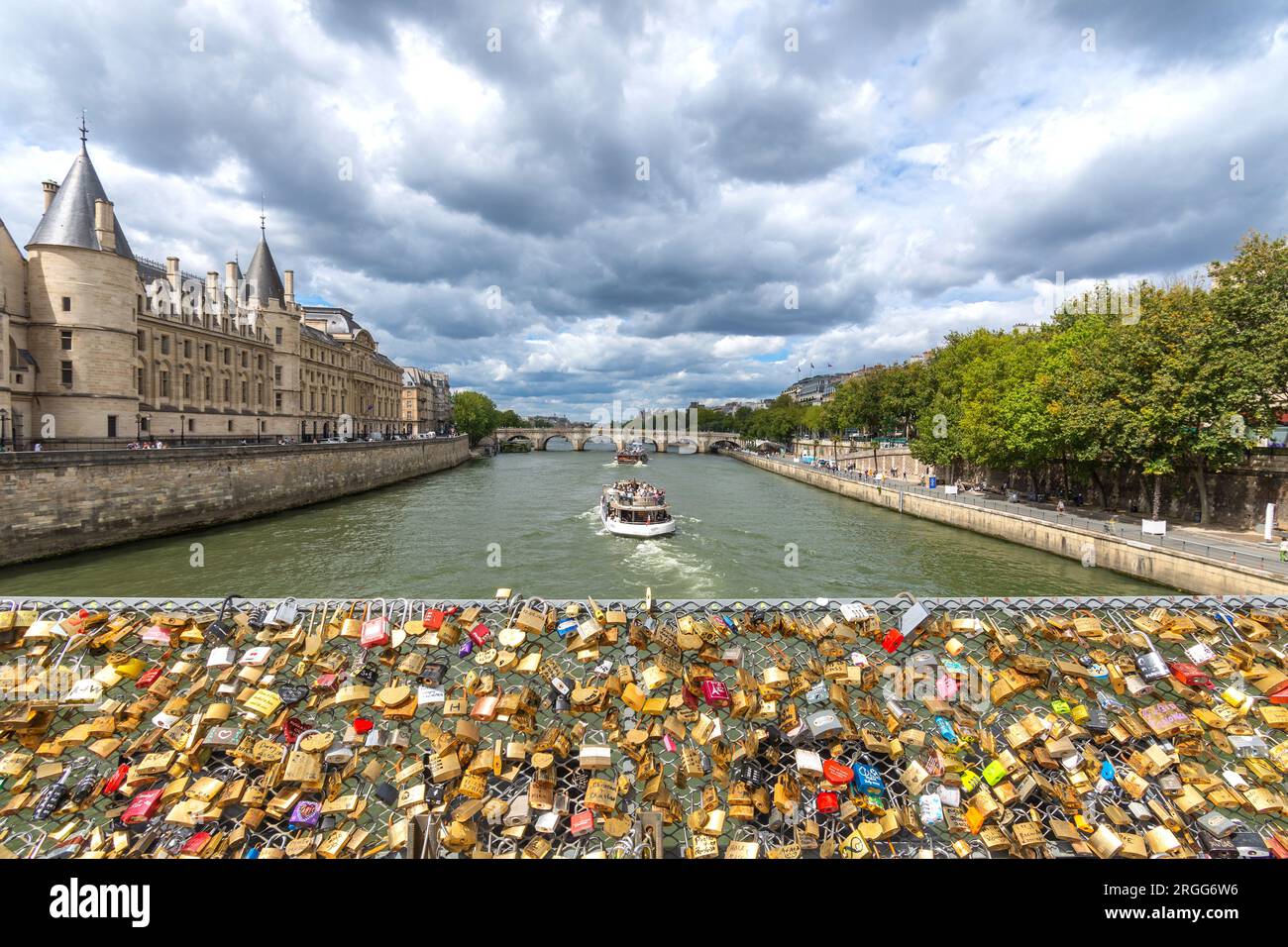 'Love locks' on panel across the river Seine, Paris, France. Stock Photo