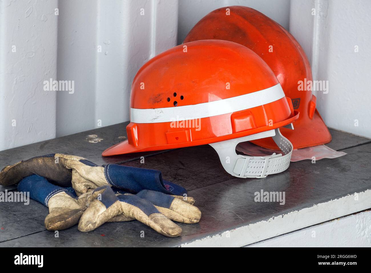Safety helmet and work gloves. Occupational health and safety. Germany