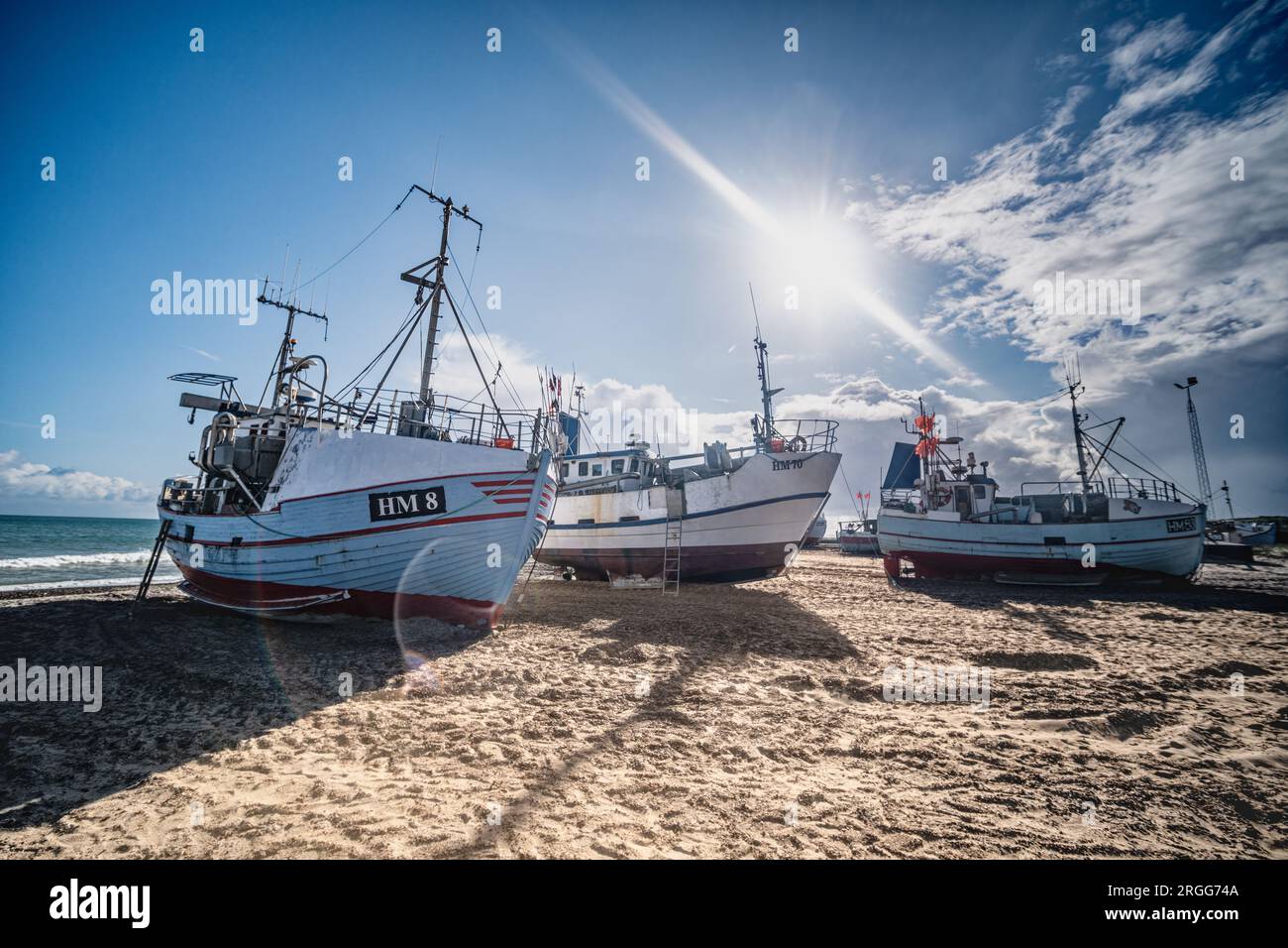 Traditional fishing vessels boats on the beach of Thorupstrand, Denmark Stock Photo