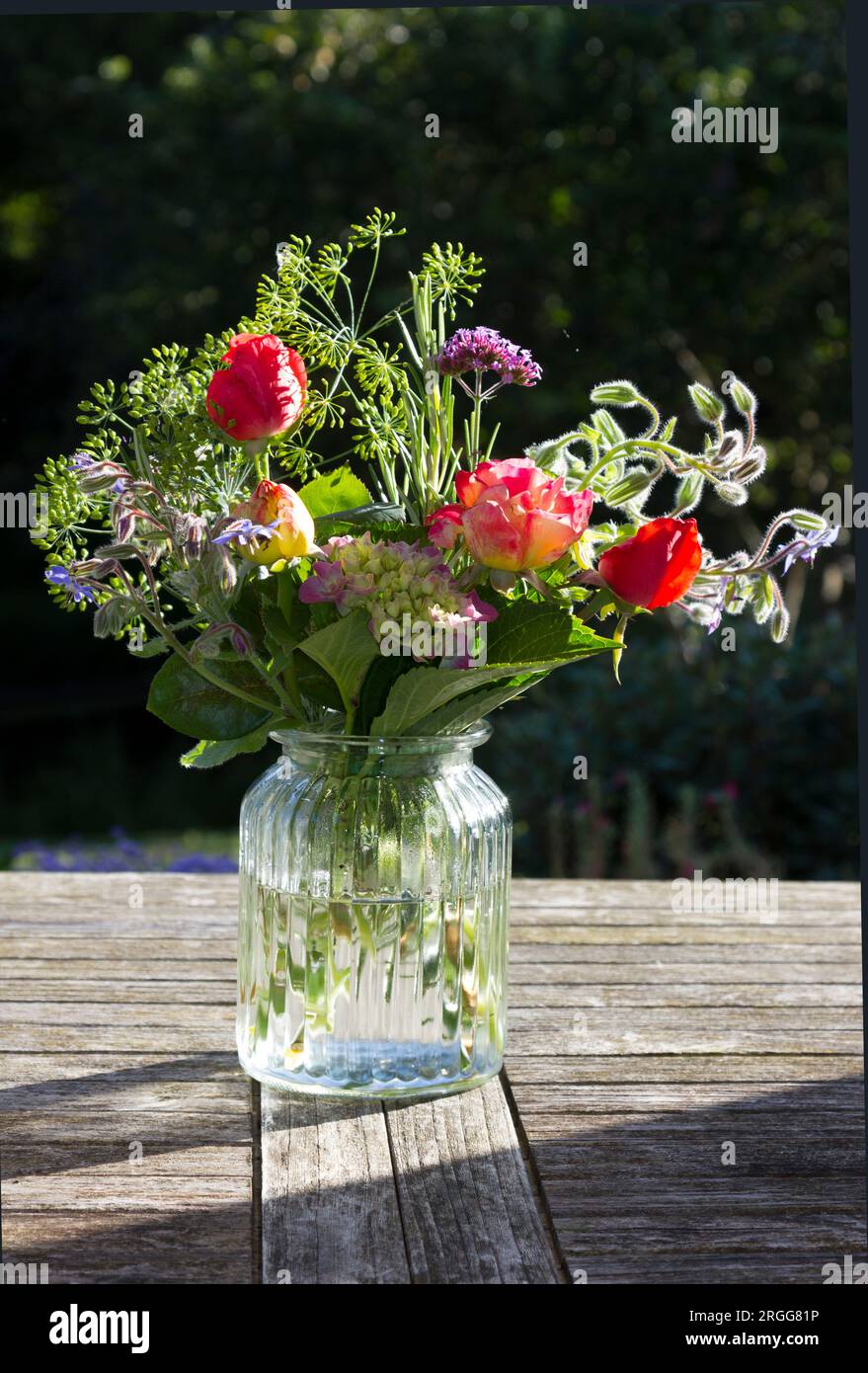 Vase of flowers on a table Stock Photo