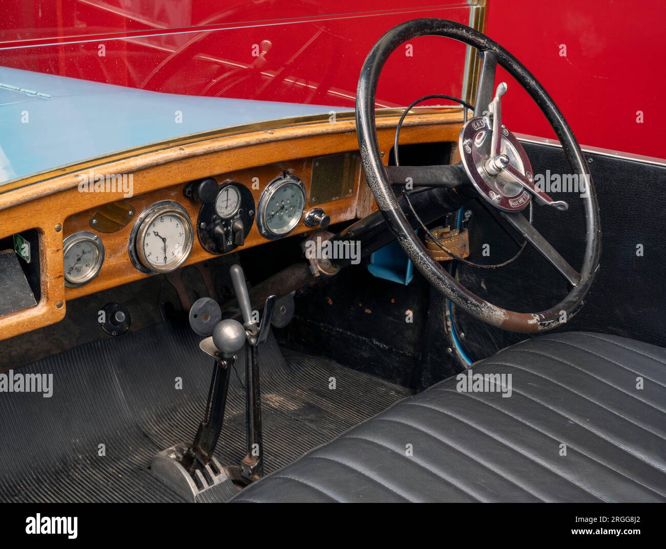 Dash board and steering wheel of Austin Twelve Clifton motor car dated 1928 at National Motor Museum, Beaulieu, New Forest, Hampshire, England, UK. Stock Photo