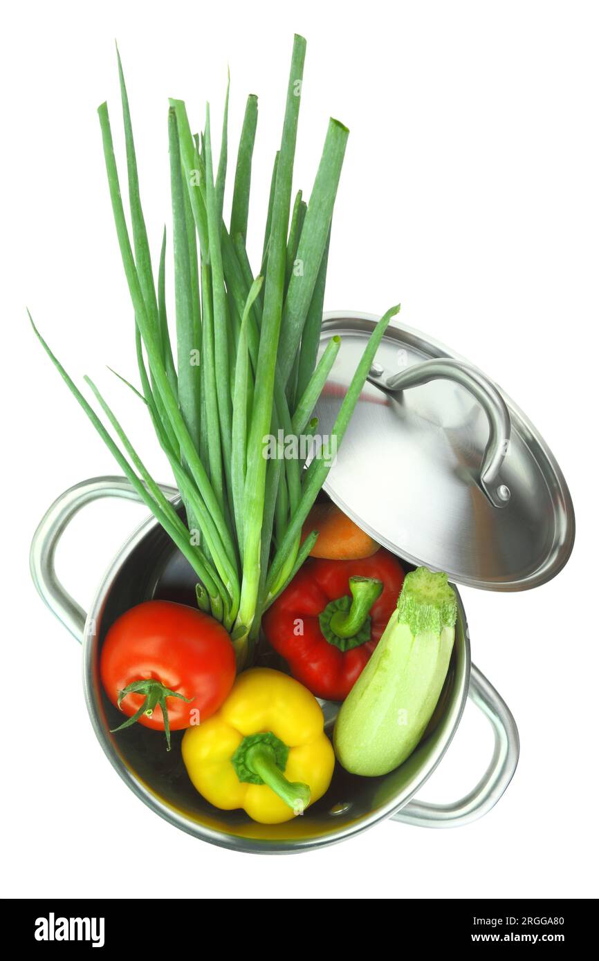 Fresh vegetables into a cooking pot isolated on white transparent background Stock Photo