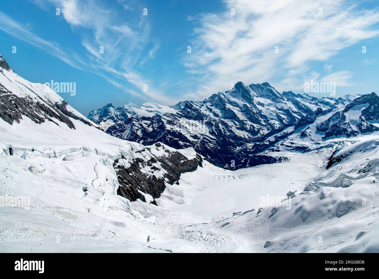 Panoramic view at 3,159 meters of the glacier Ischmeer (Ice Sea) Located behind the south-east face of the Eiger mountain peak in Switzerland close to Stock Photo