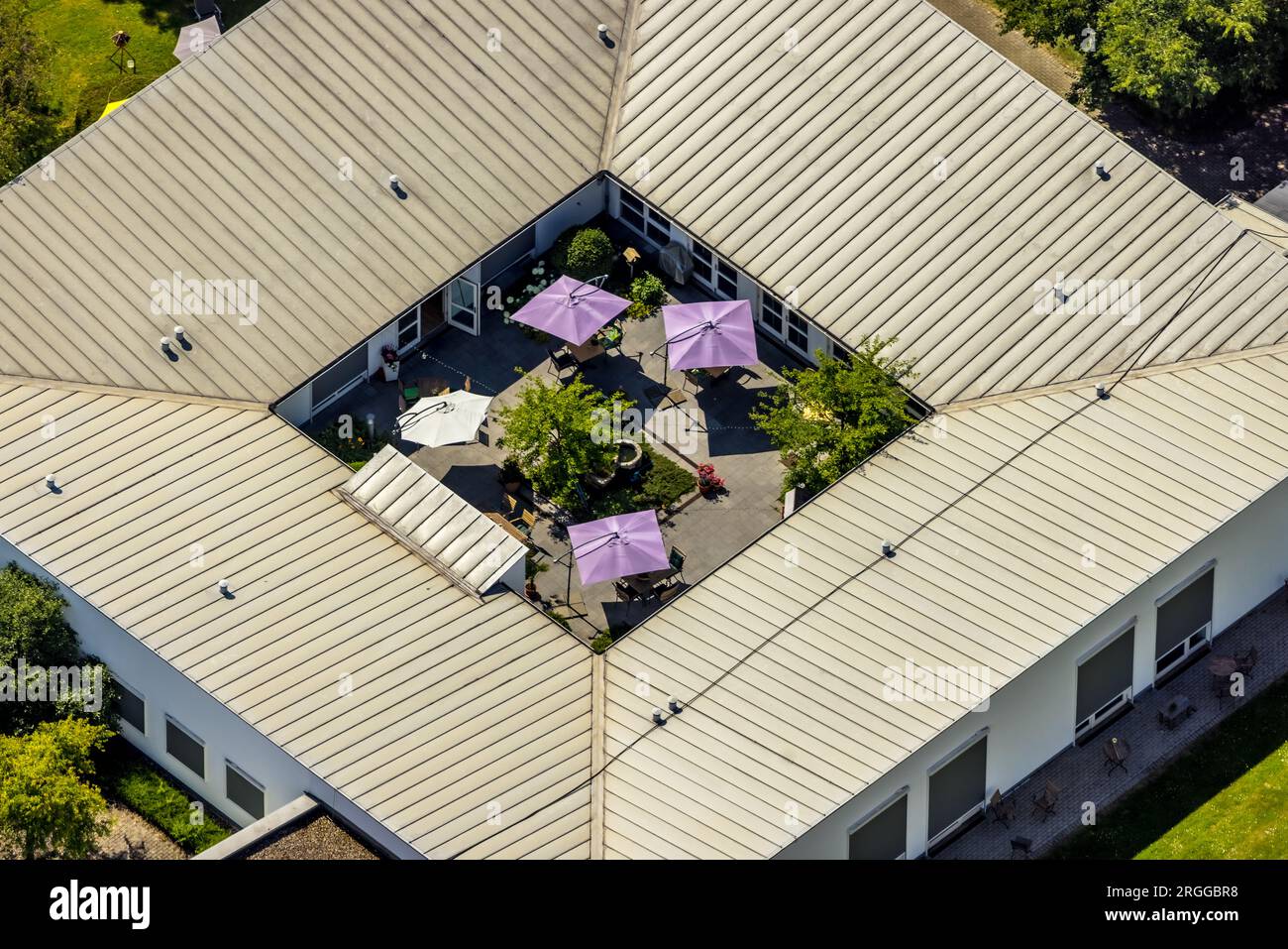 Aerial view, Malteser Hospizzentrum St. Raphael, with sunshades in the courtyard, Huckingen, Duisburg, Ruhr area, North Rhine-Westphalia, Germany Stock Photo