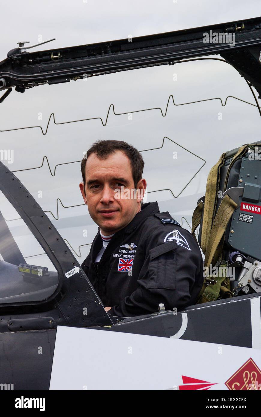Pilot Dave Davies, Royal Air Force BAe Hawk solo display pilot in cockpit of jet plane. Canopy explosive cord for emergency ejection seat Stock Photo