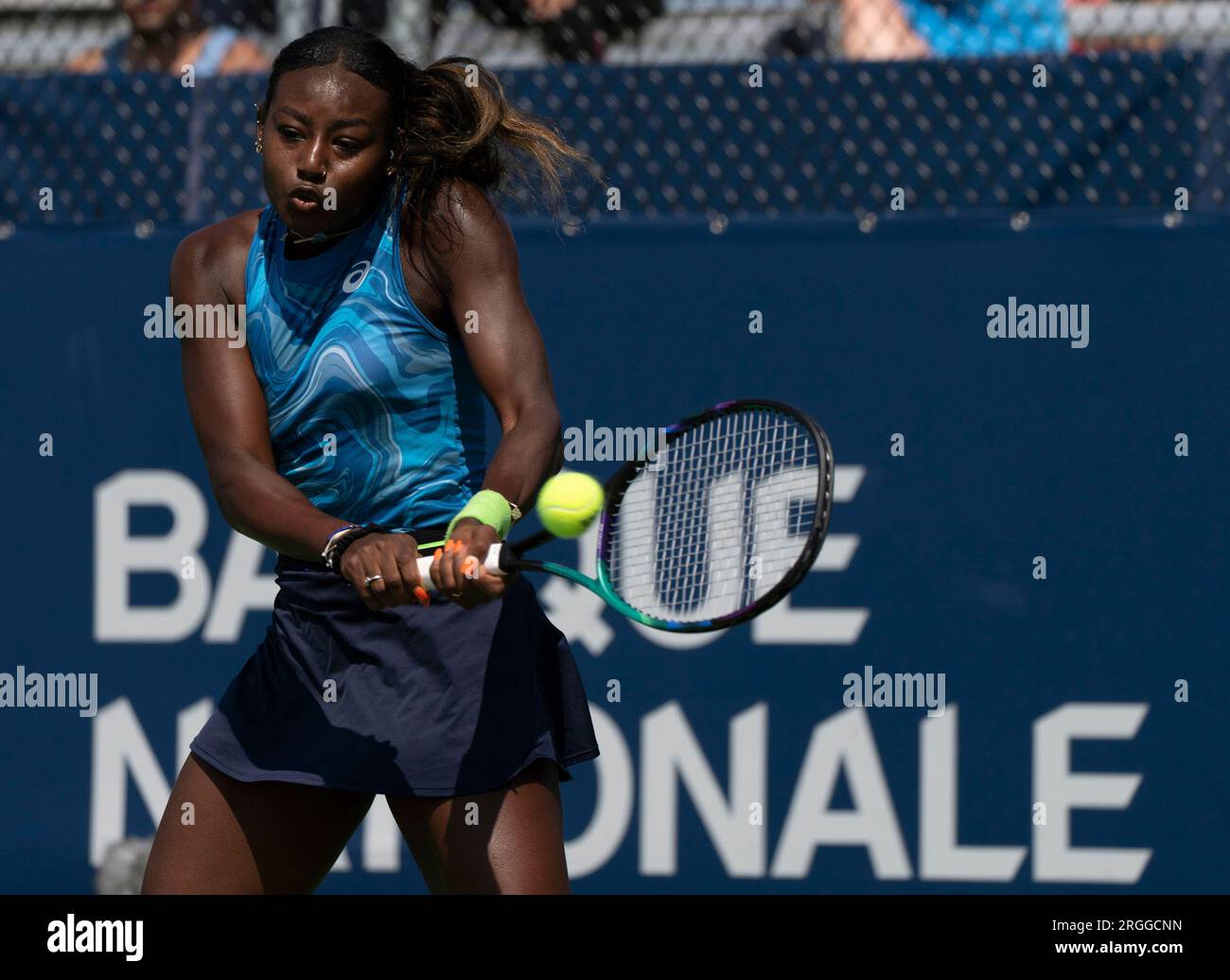 Alycia Parks hits a return to Belinda Bencic, of Switzerland, during the National Bank Open tennis tournament in Montreal, Wednesday, Aug