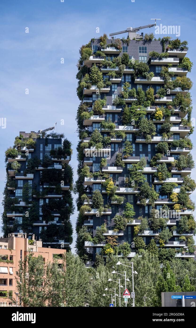 View of the balconies and terraces of Bosco Verticale, full of green plants. Spring time. 08–08-2023. Milan, Porta Nuova skyscraper residences, Italy. Stock Photo