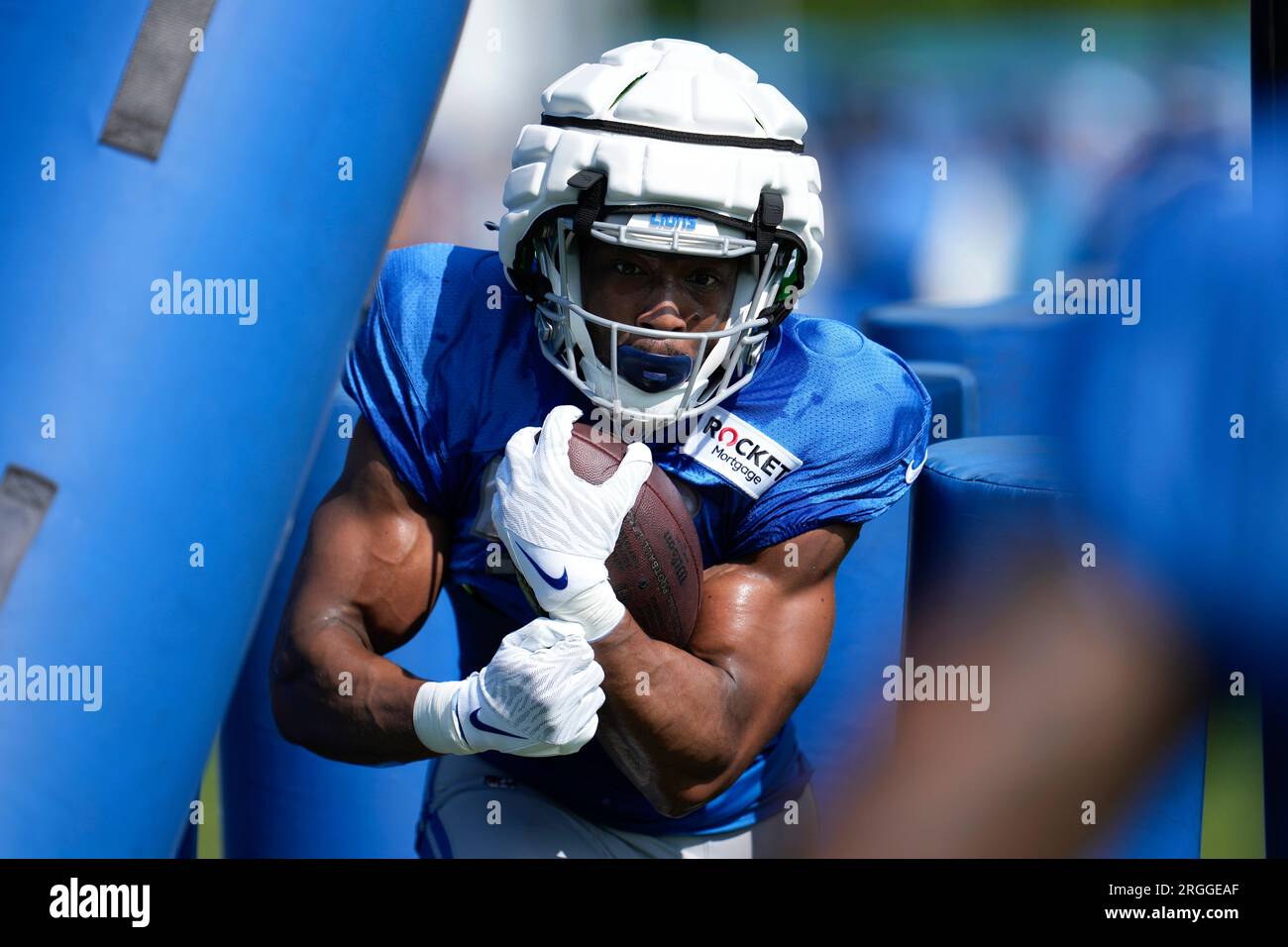 Detroit Lions running back Devine Ozigbo (30) carries the ball during the  second half of an NFL preseason football game against the New York Giants,  Friday, Aug. 11, 2023, in Detroit. (AP