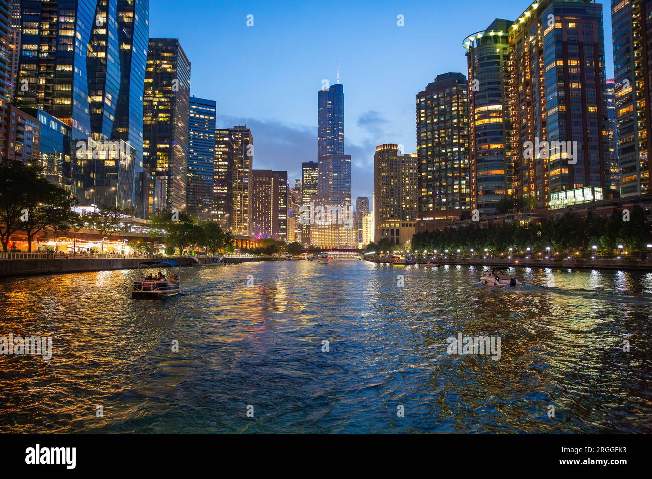 Water level perspective photo of Chicago River at night looking at