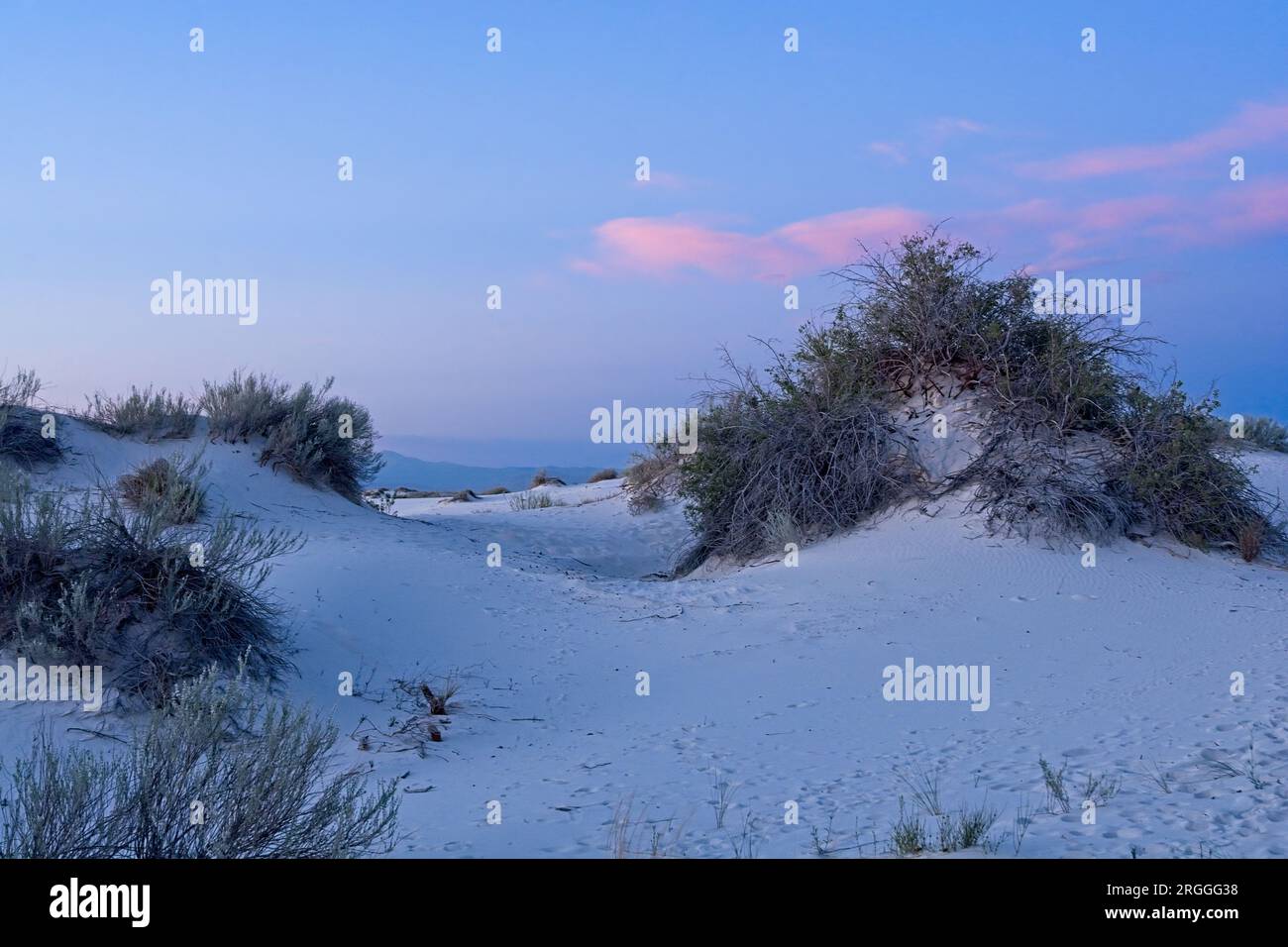 White Sands National Park at sunset with gypsum sands reflecting the