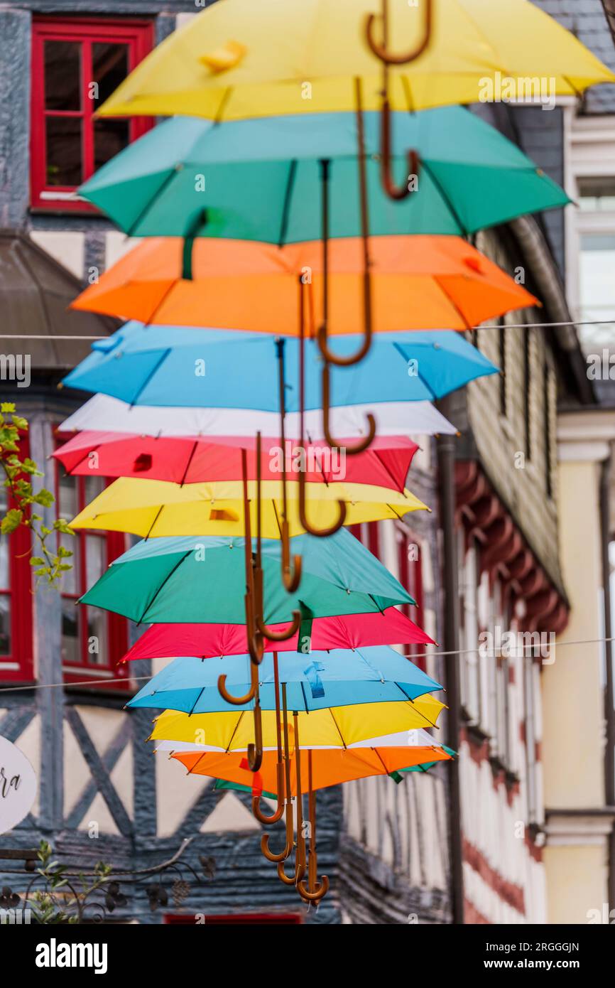 gelnhausen-germany-09th-aug-2023-colorful-umbrellas-hang-in-a