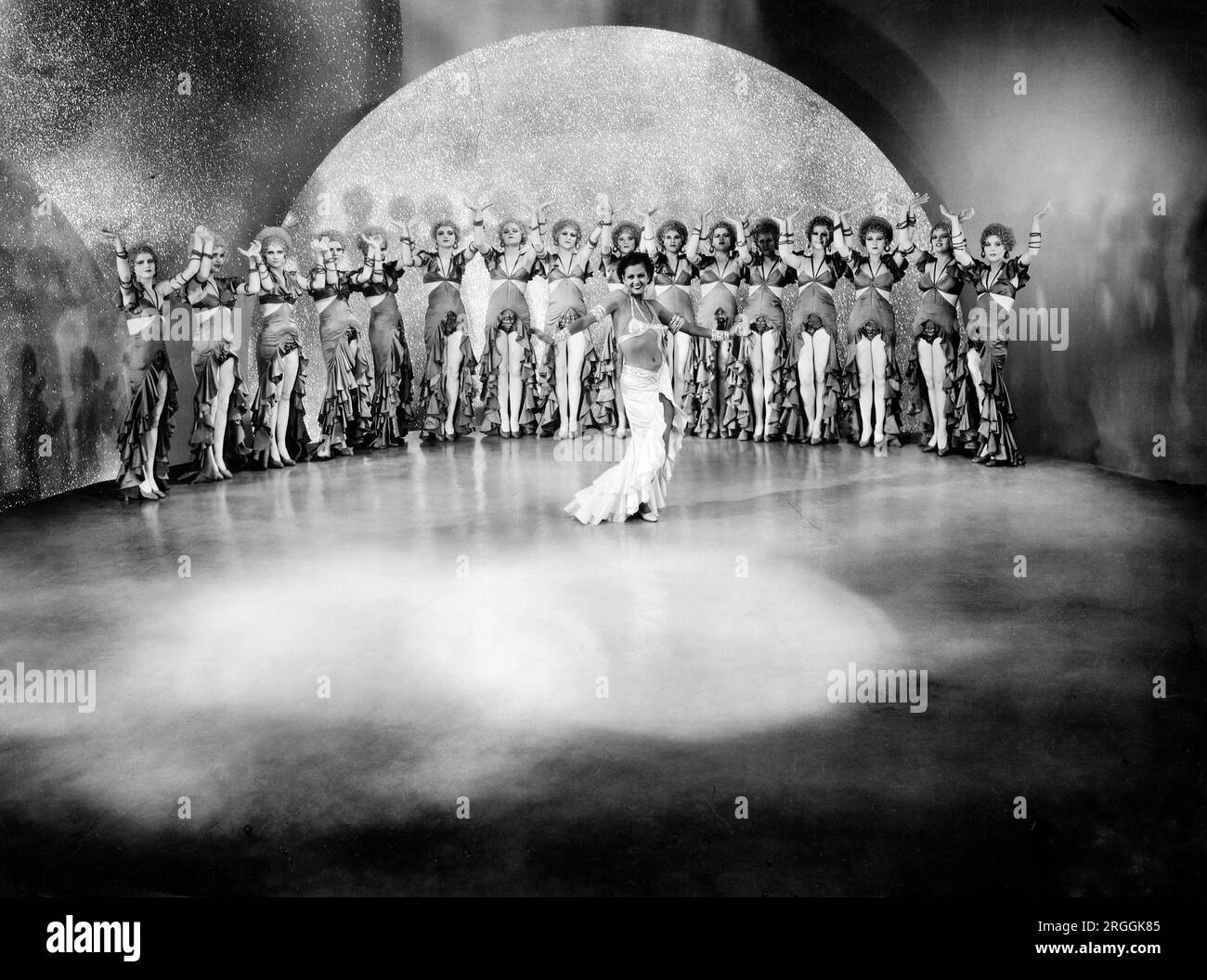 Large Stage Production, onset of the Film, "Too Much Harmony